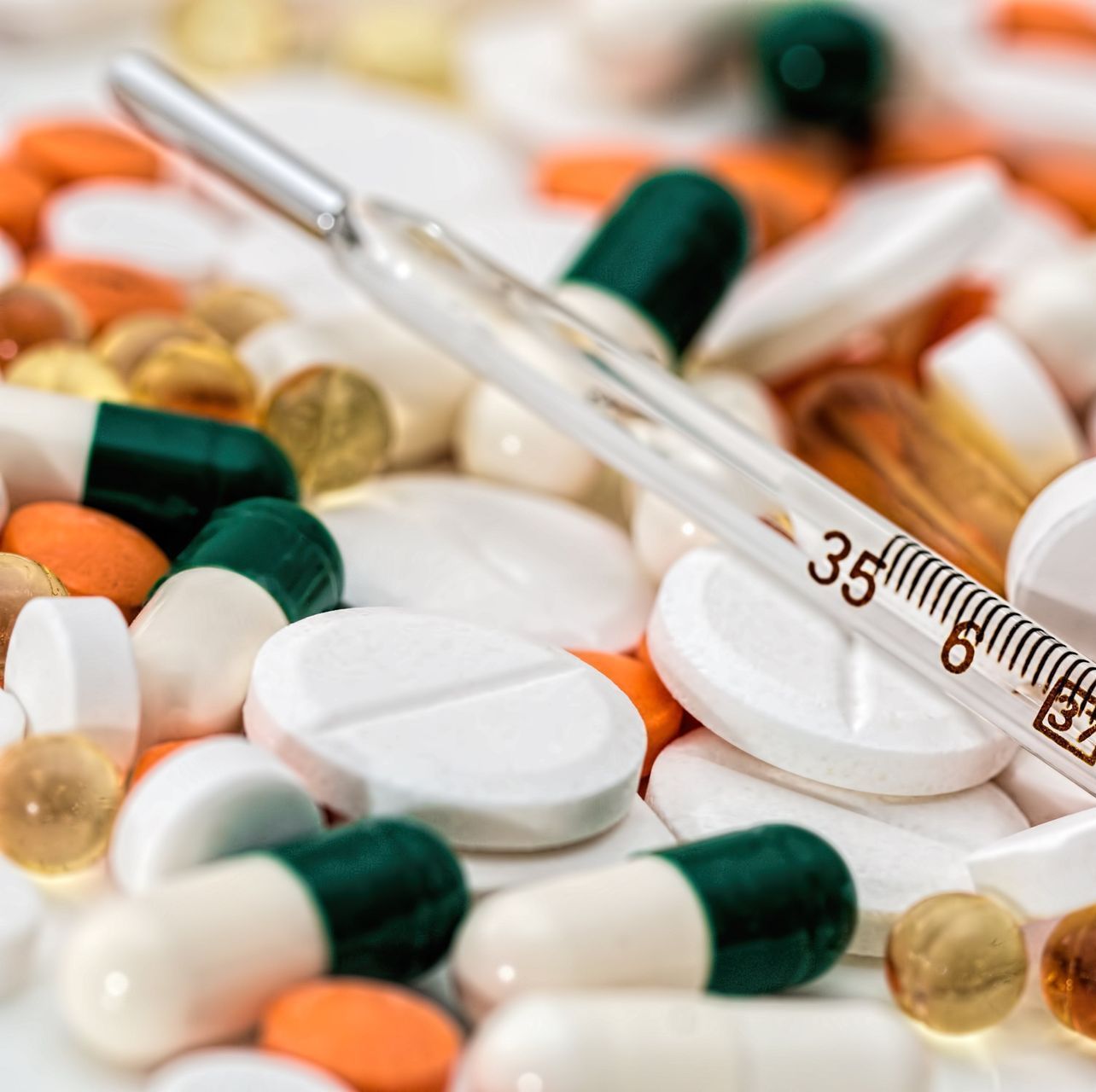 pills and a thermometer