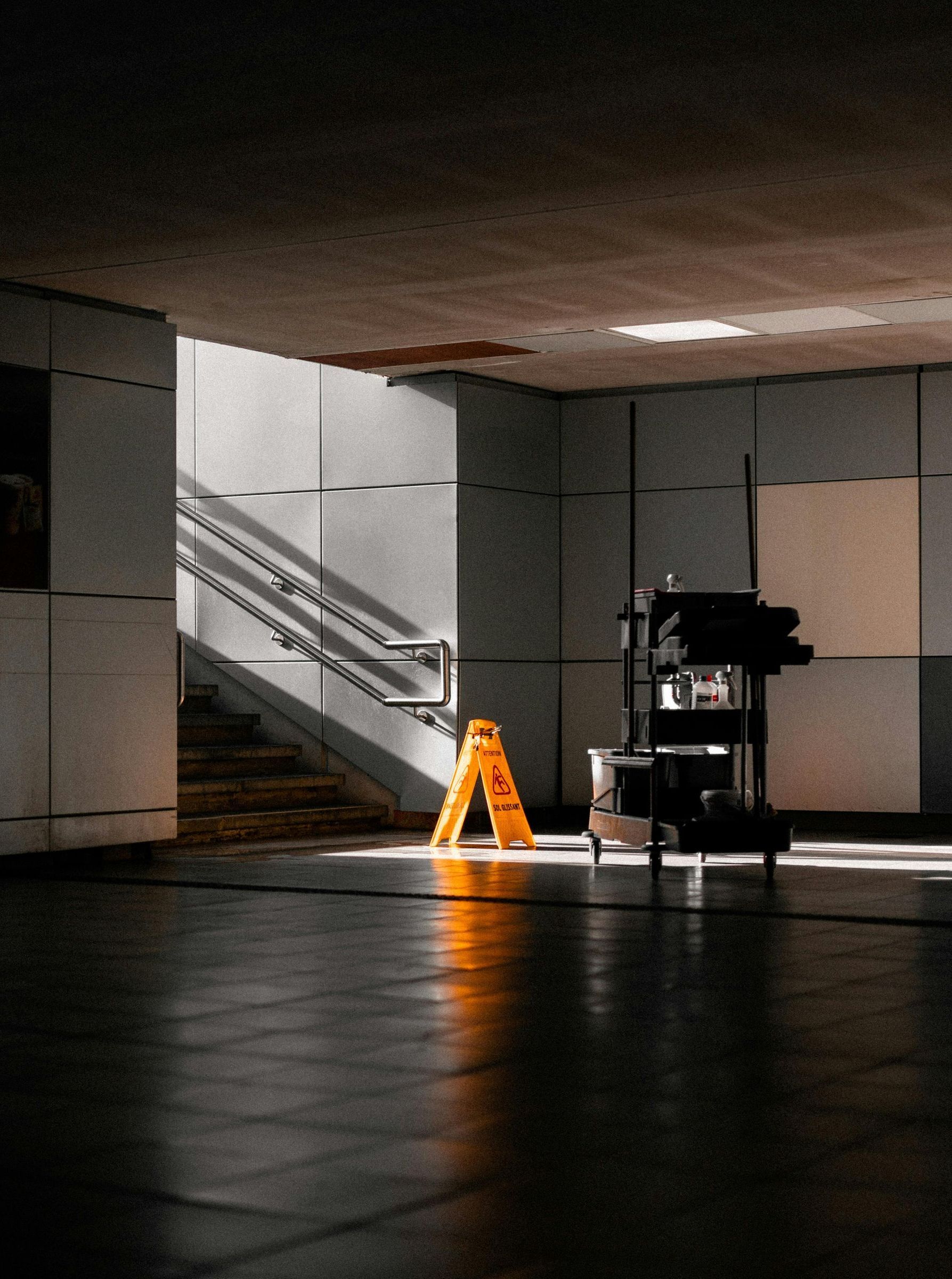 building with wet floor sign