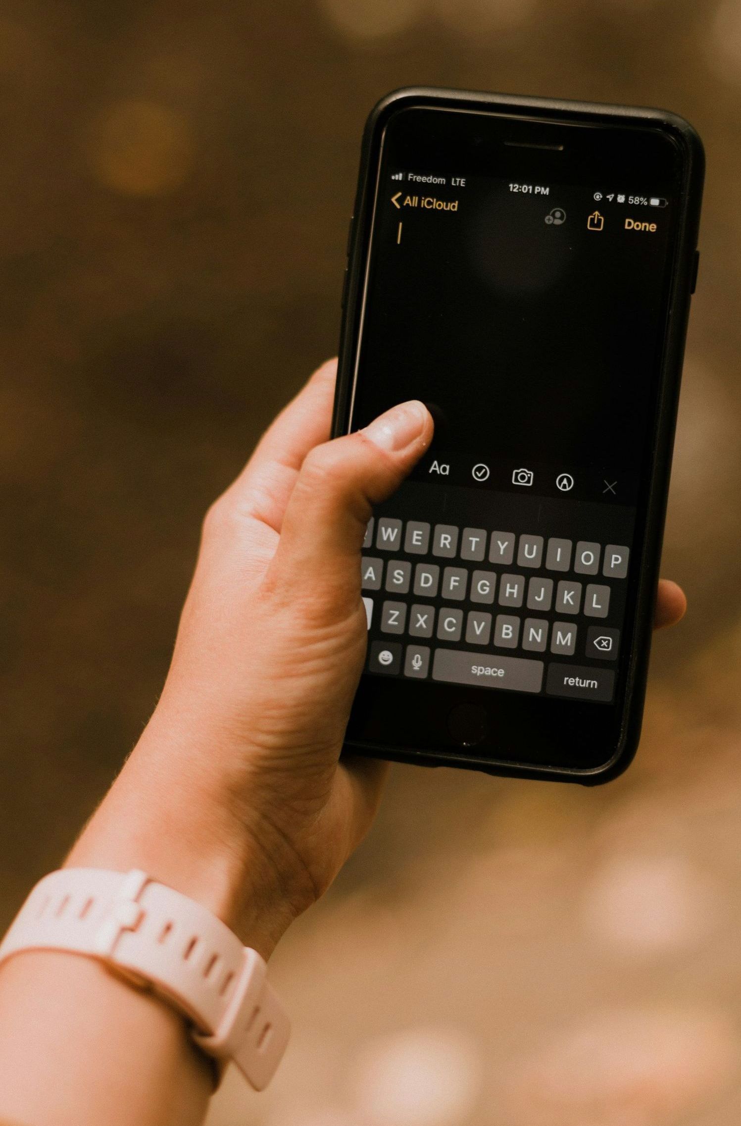 woman texting on phone