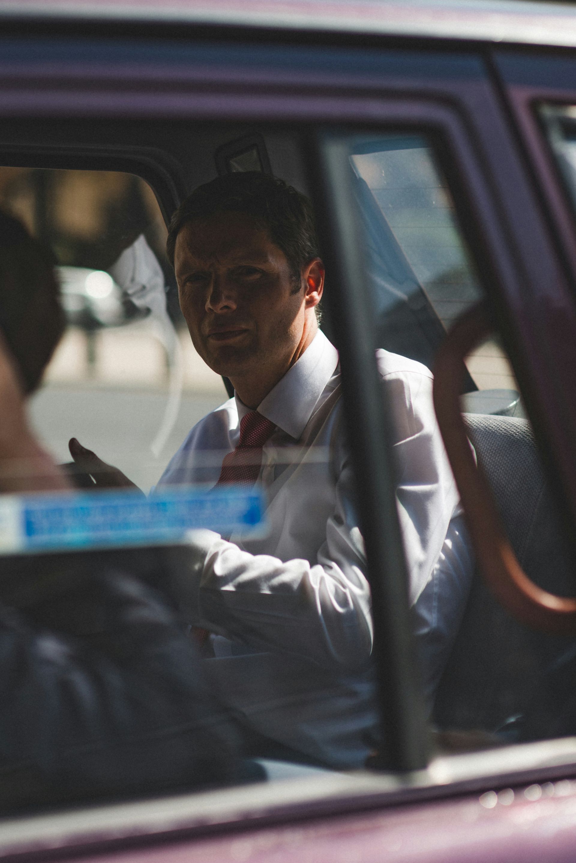 man in car