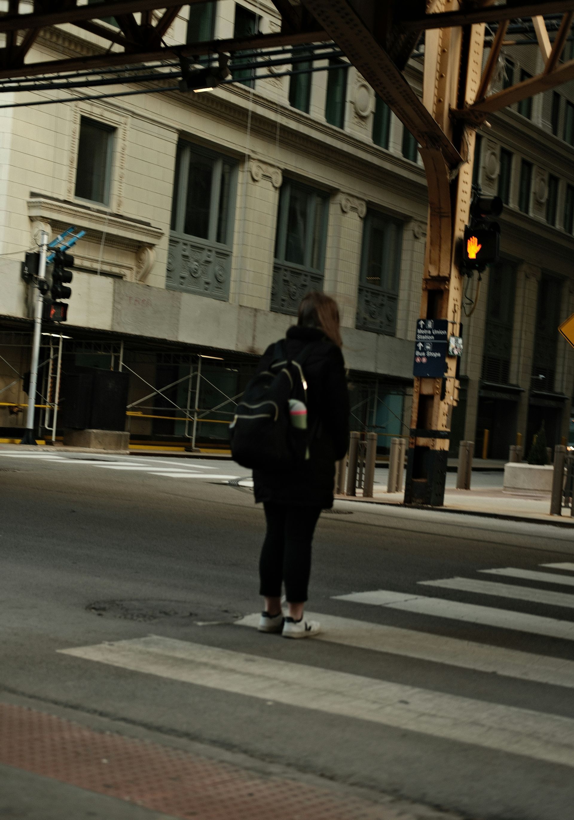 woman at a crosswalk