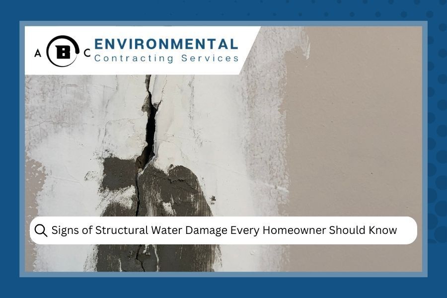 Crack in wall with water damage, ABC Environmental logo and 