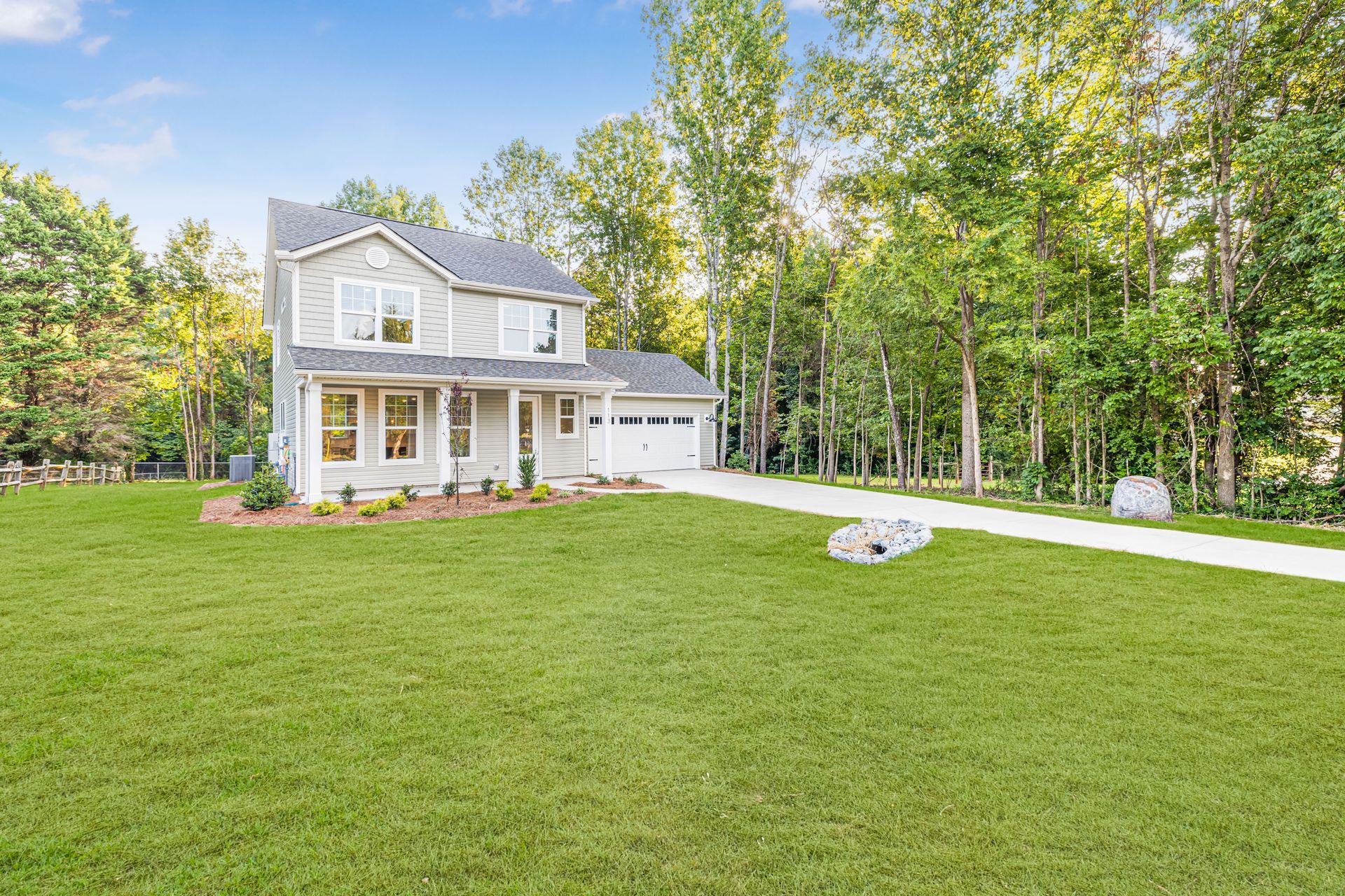 photo of Belmont floorplan front exterior with attached garage