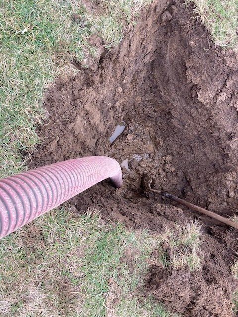 Lifting Septic Tank Cover — Dubuque, IA — Triple J Septic Services Lifting Septic Tank Cover — Dubuque, IA — Triple J Septic Services