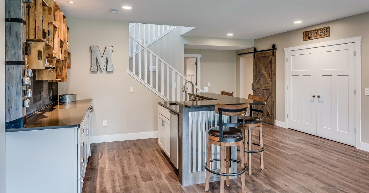 There is a staircase leading up to the second floor in the basement.