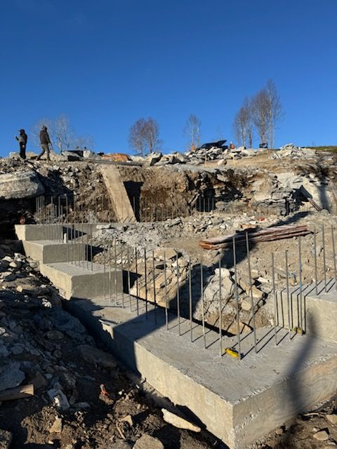 A construction site with a blue sky in the background