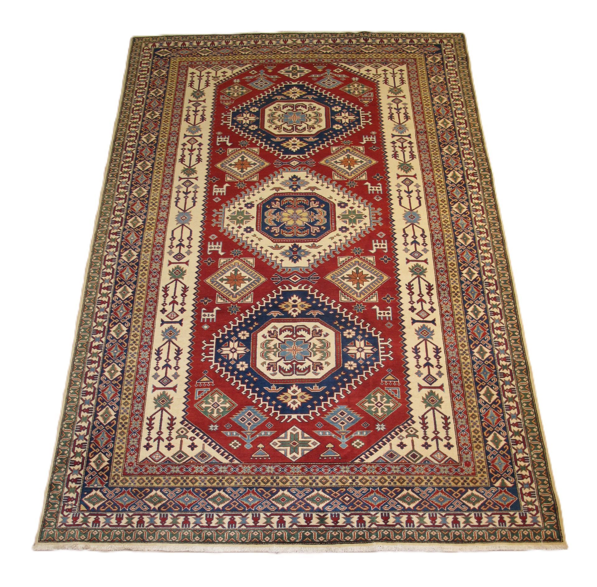 Oriental rug with red central field and geometric patterns in blue, beige, and brown.
