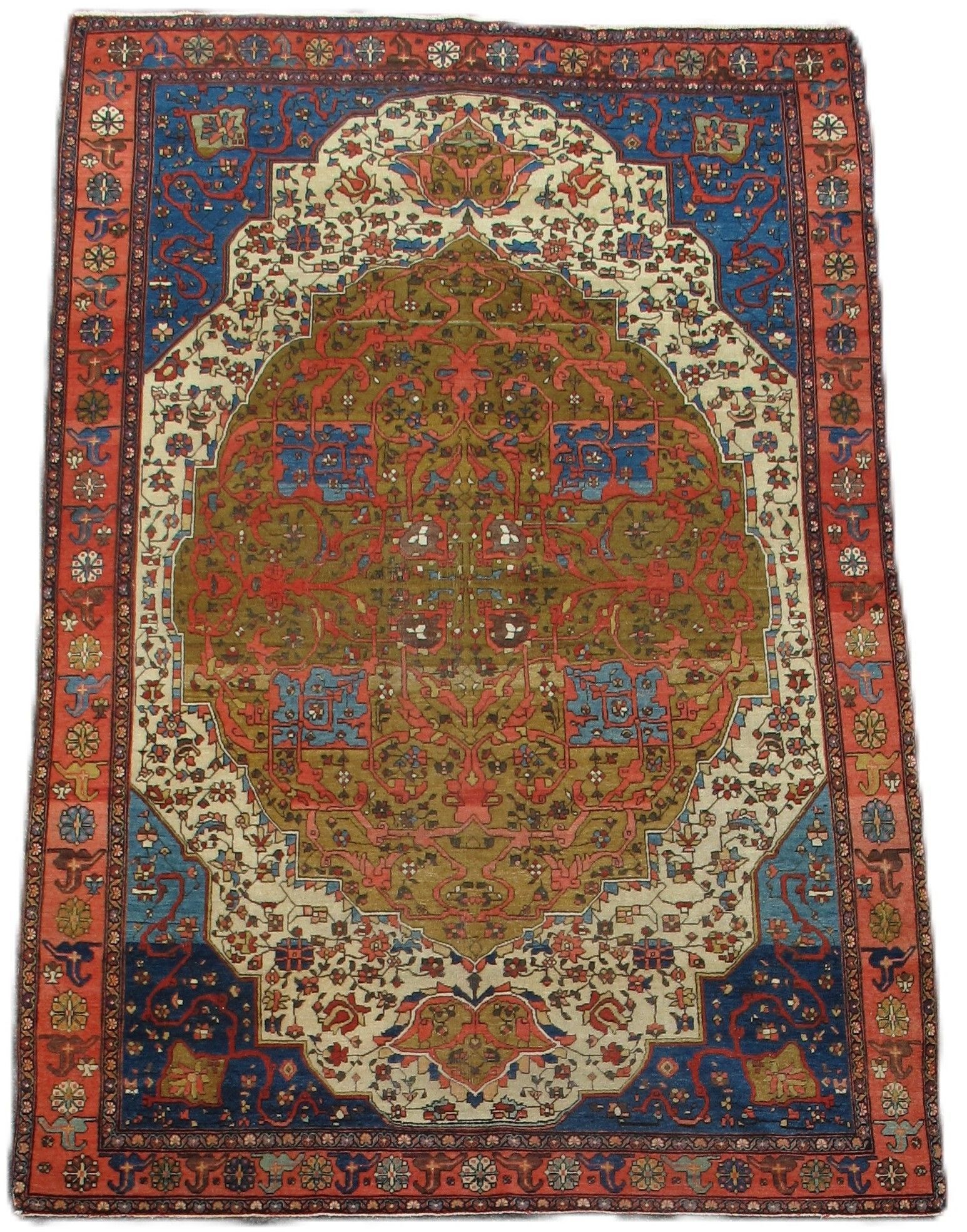 Decorative red, blue, and cream patterned rug with a large central medallion.