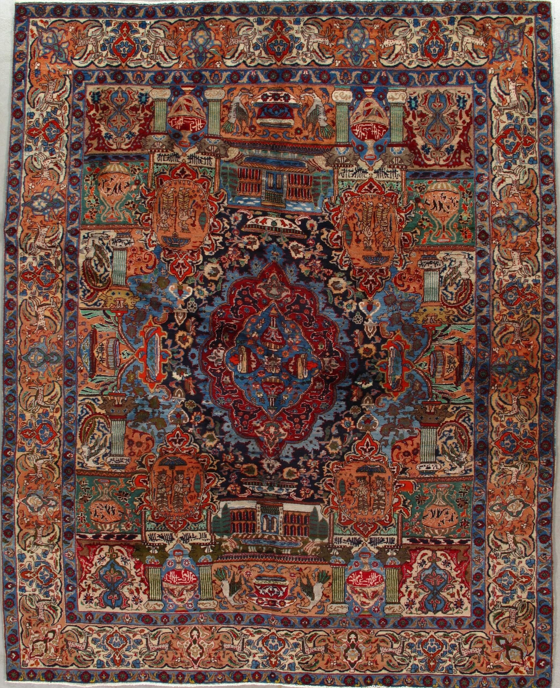 A rug with a floral pattern on it is hanging on a wall.