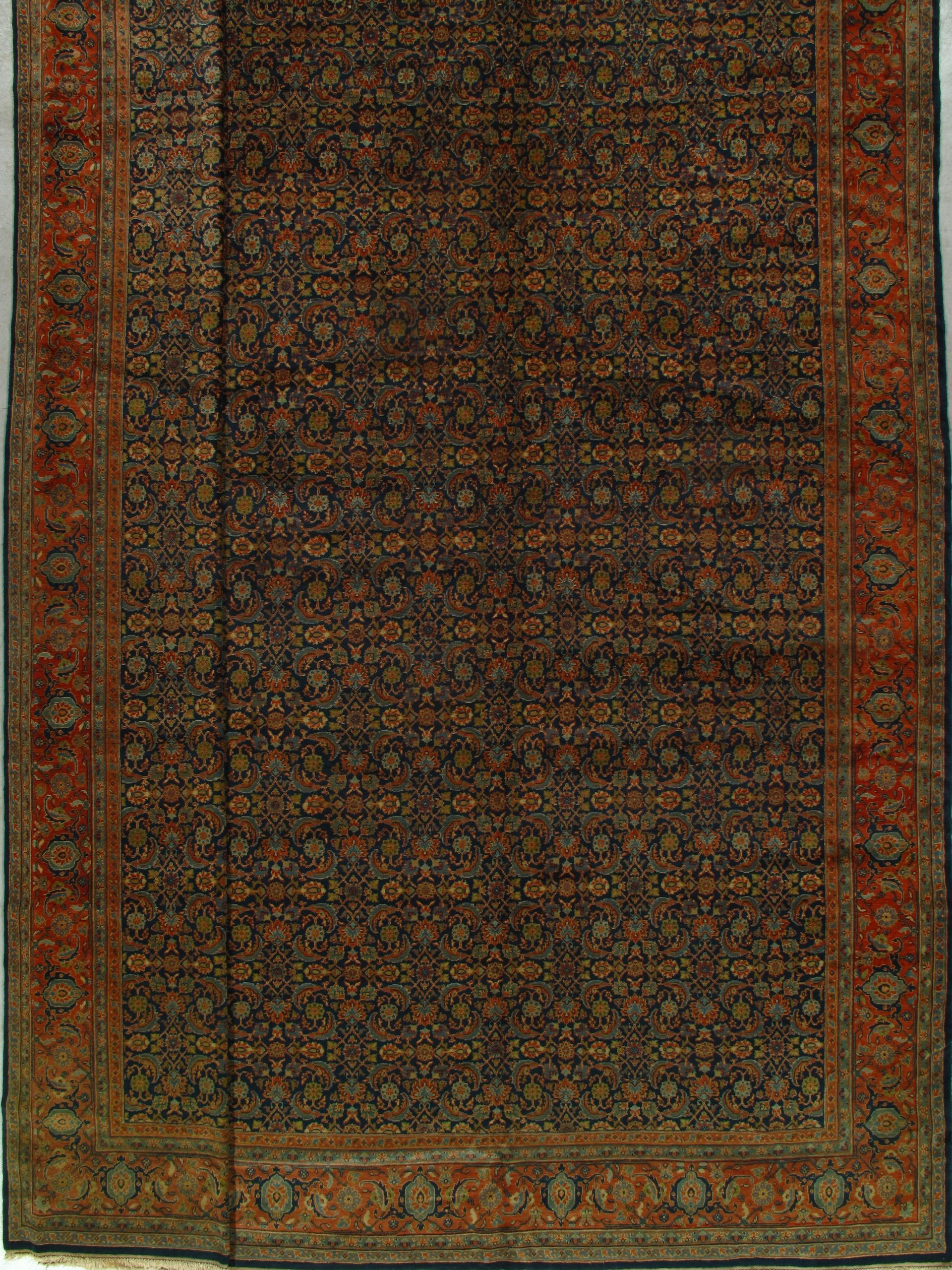 A close up of a rug with a pattern on it.