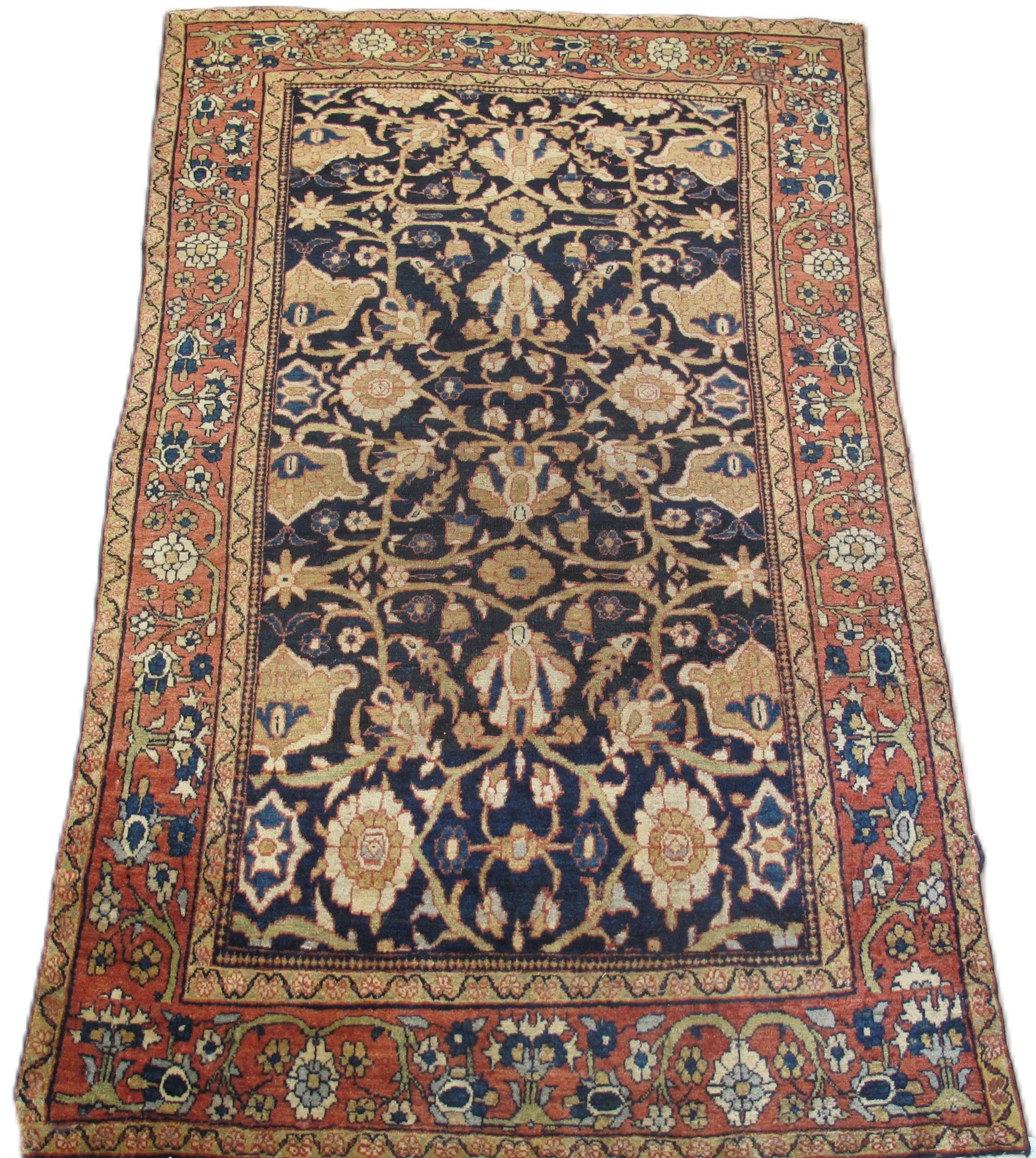 A rug with a floral pattern on it is on a white background