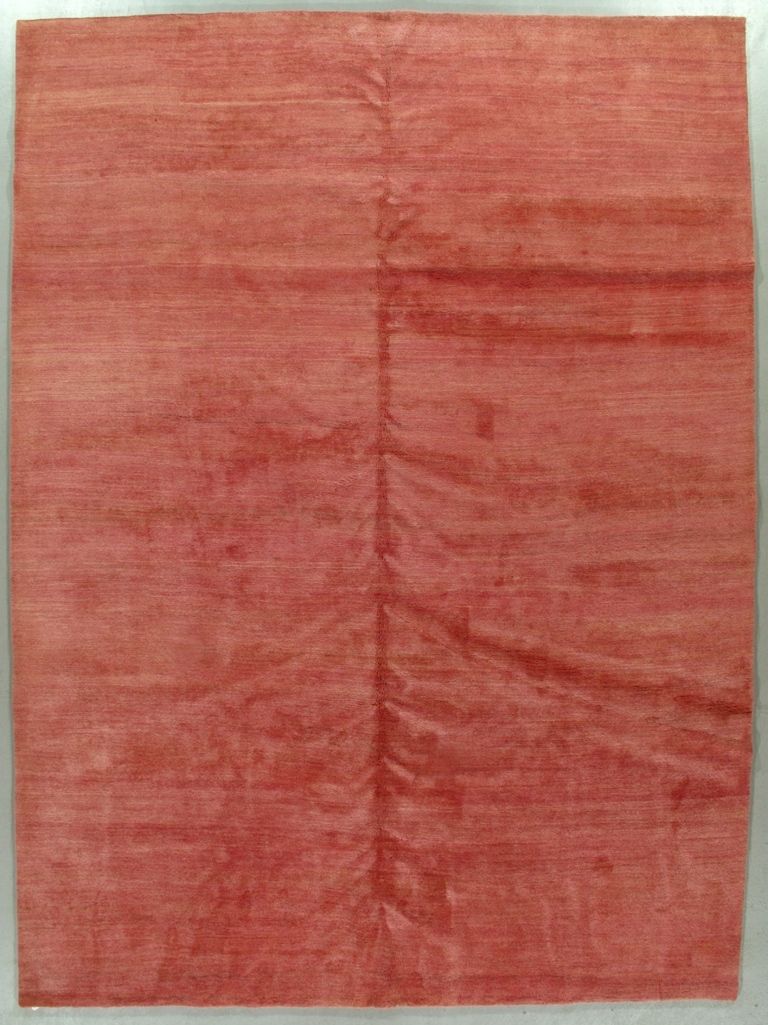 Red, textured paper with a vertical seam down the center.