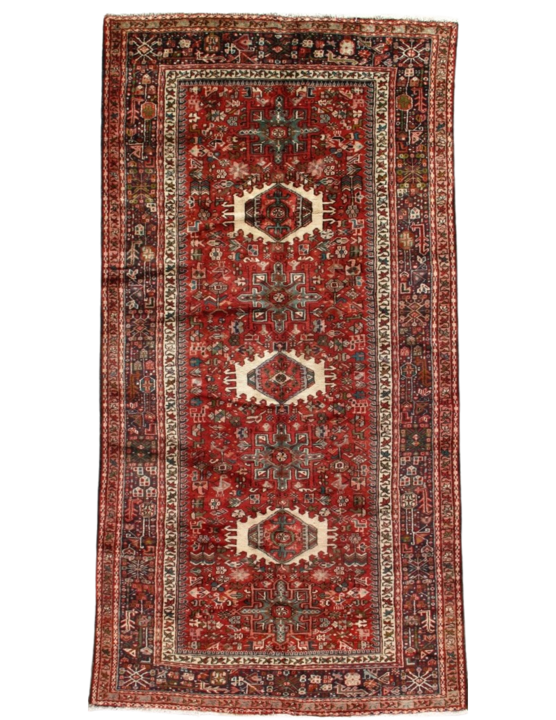 Red and dark Persian rug with cream and dark blue geometric patterns and border.
