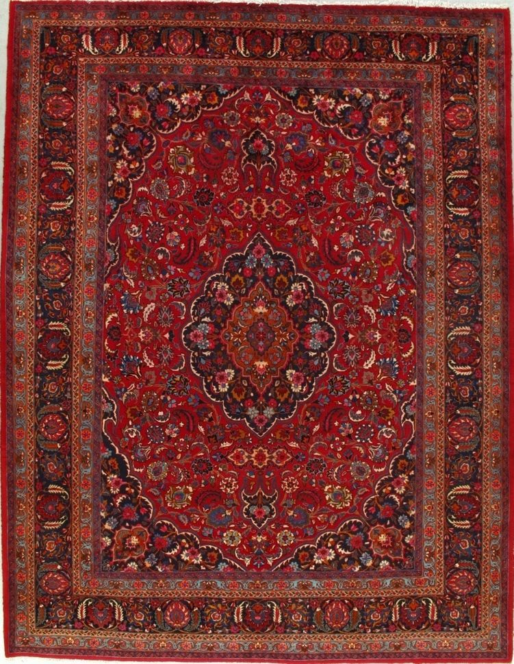 Red Oriental-style rug with intricate red, gold, and blue floral medallion pattern