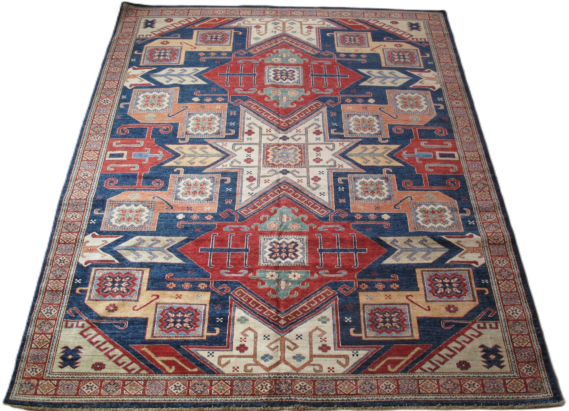 A rug with a geometric pattern on it is on a white background.
