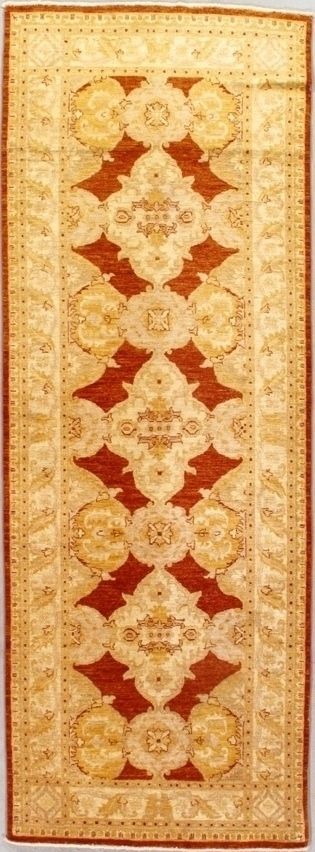 Beige and red patterned rug with a vertical floral medallion design