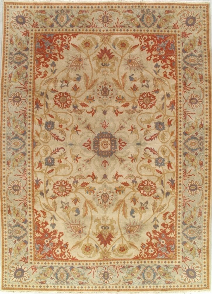 Beige and red floral Persian-style rug with ornate central medallion and border