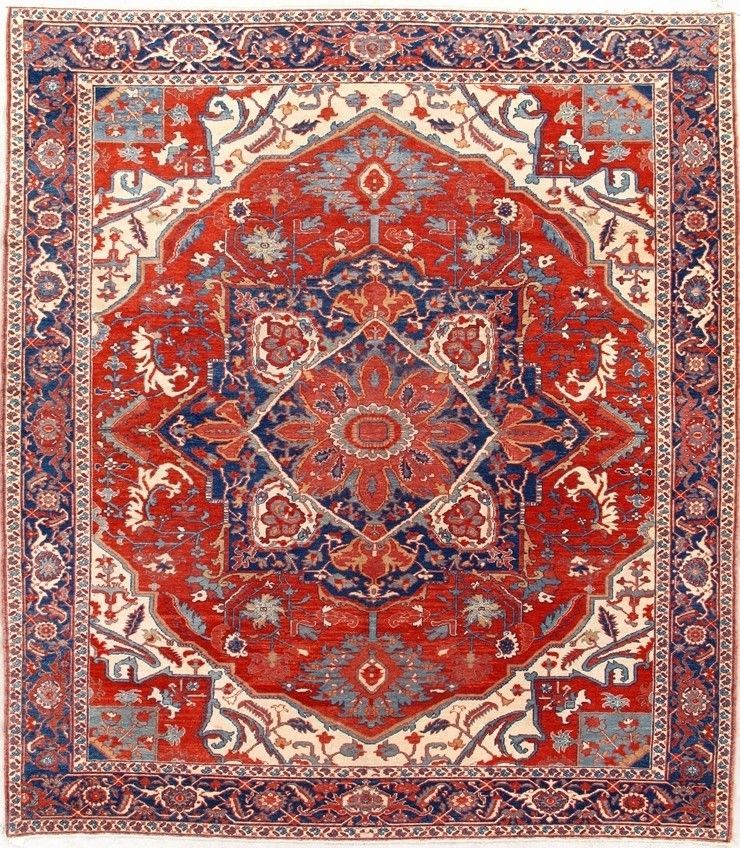 Red and blue patterned Oriental rug with a central medallion design.