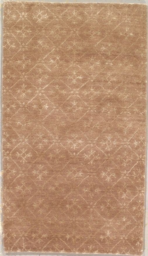 Tan rectangular card with repeating white floral diamond pattern.