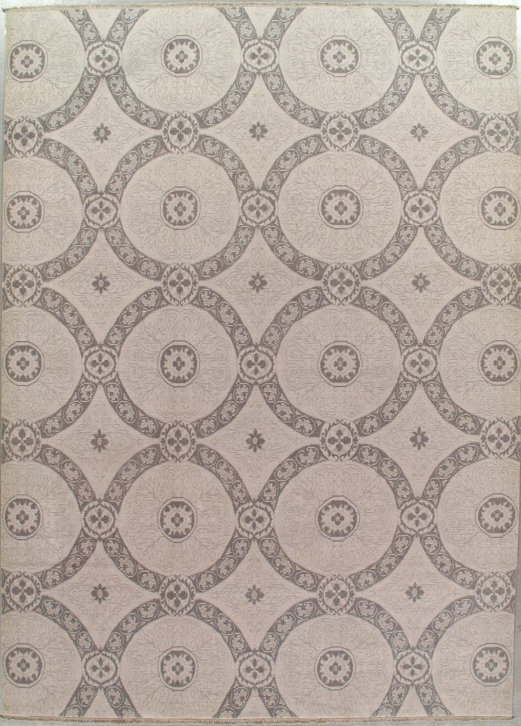 Beige and gray repeating circular wallpaper pattern with ornate floral details