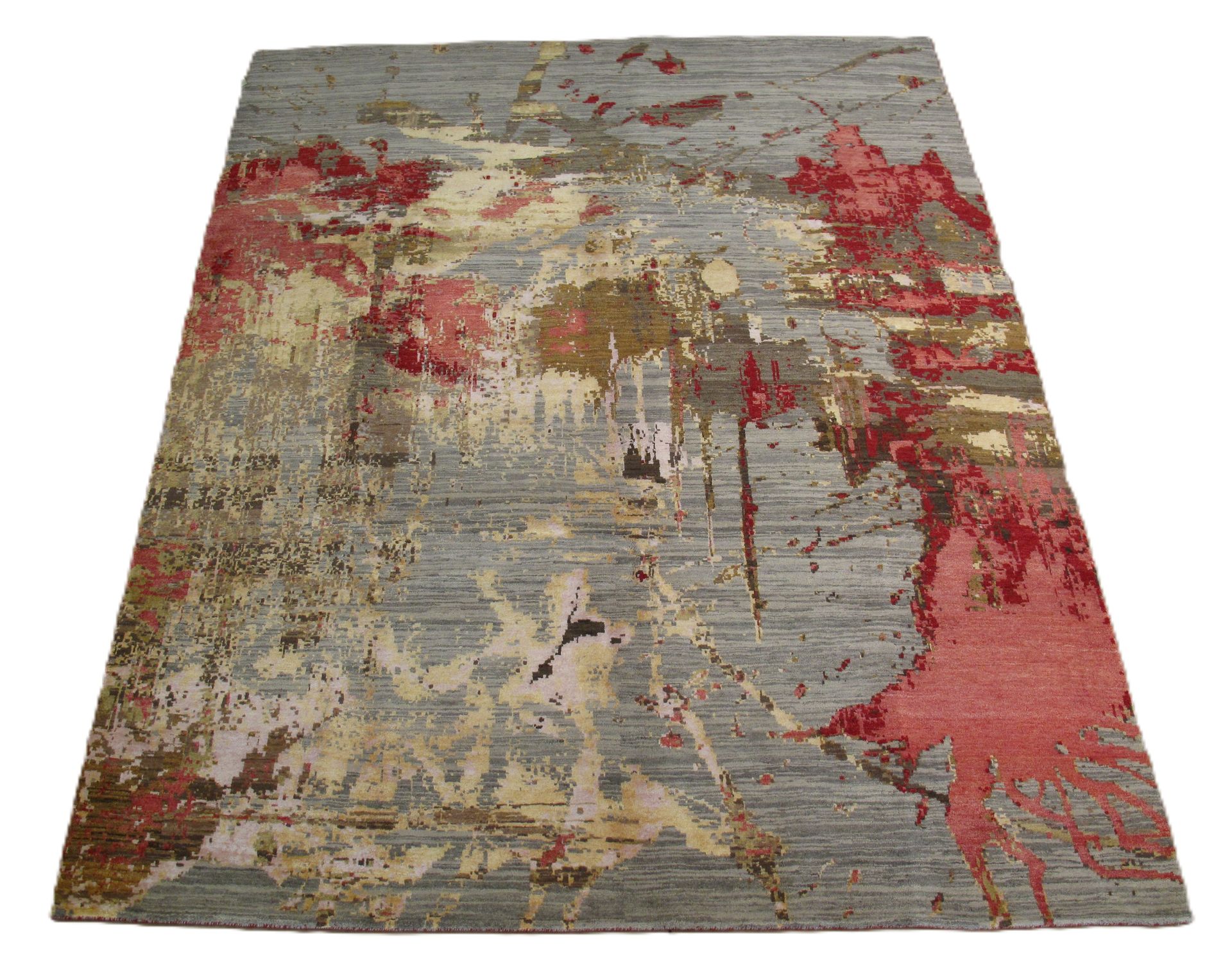 Abstract rug with red, gold, and grey splashes.