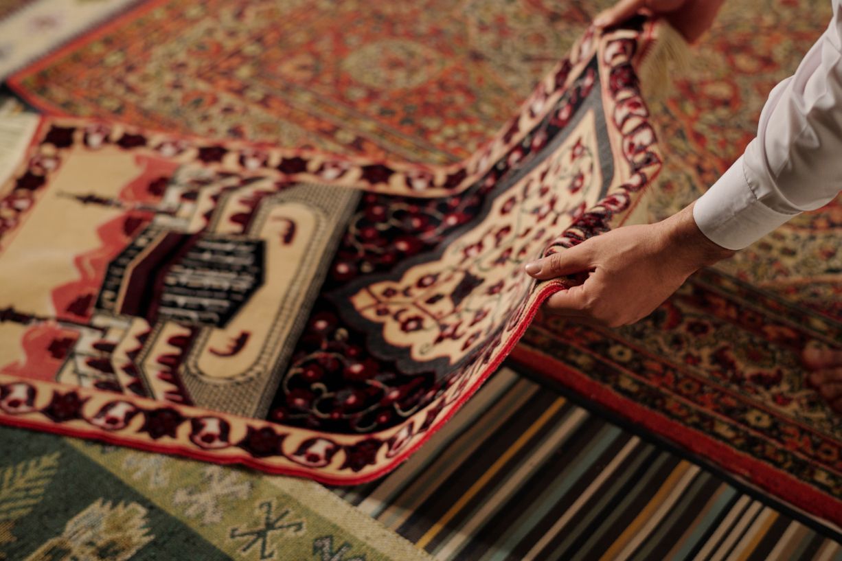 Expert handling of antique hand-knotted rug, Oriental rug cleaning and moth treatment, First Rugs