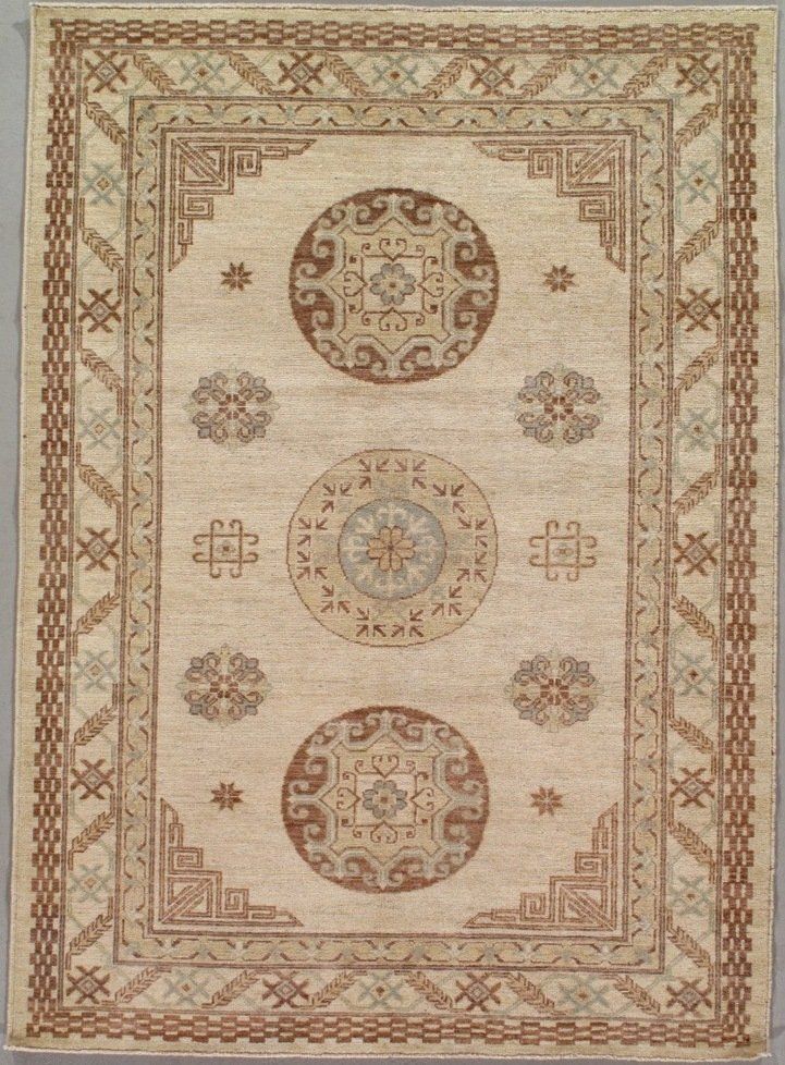 A rug with a pattern of circles and stars on it