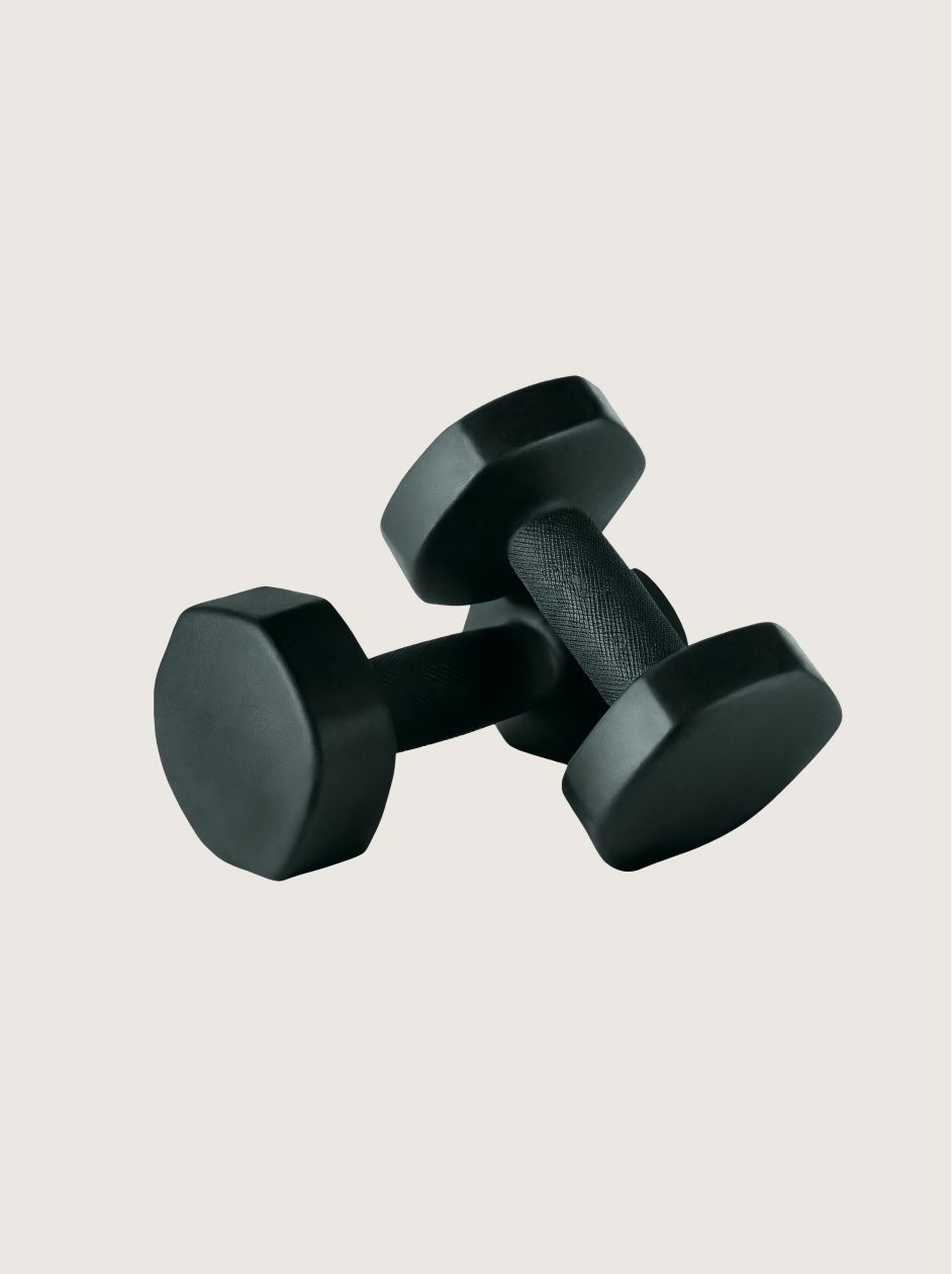 Black dumbbell with hexagonal ends on a light background