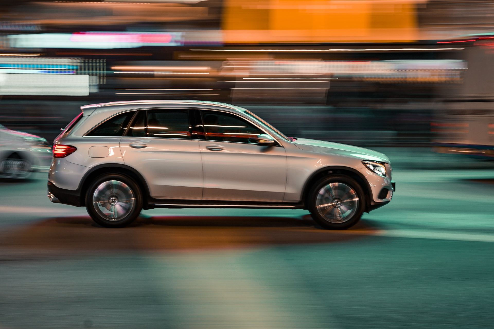 car driving fast on road