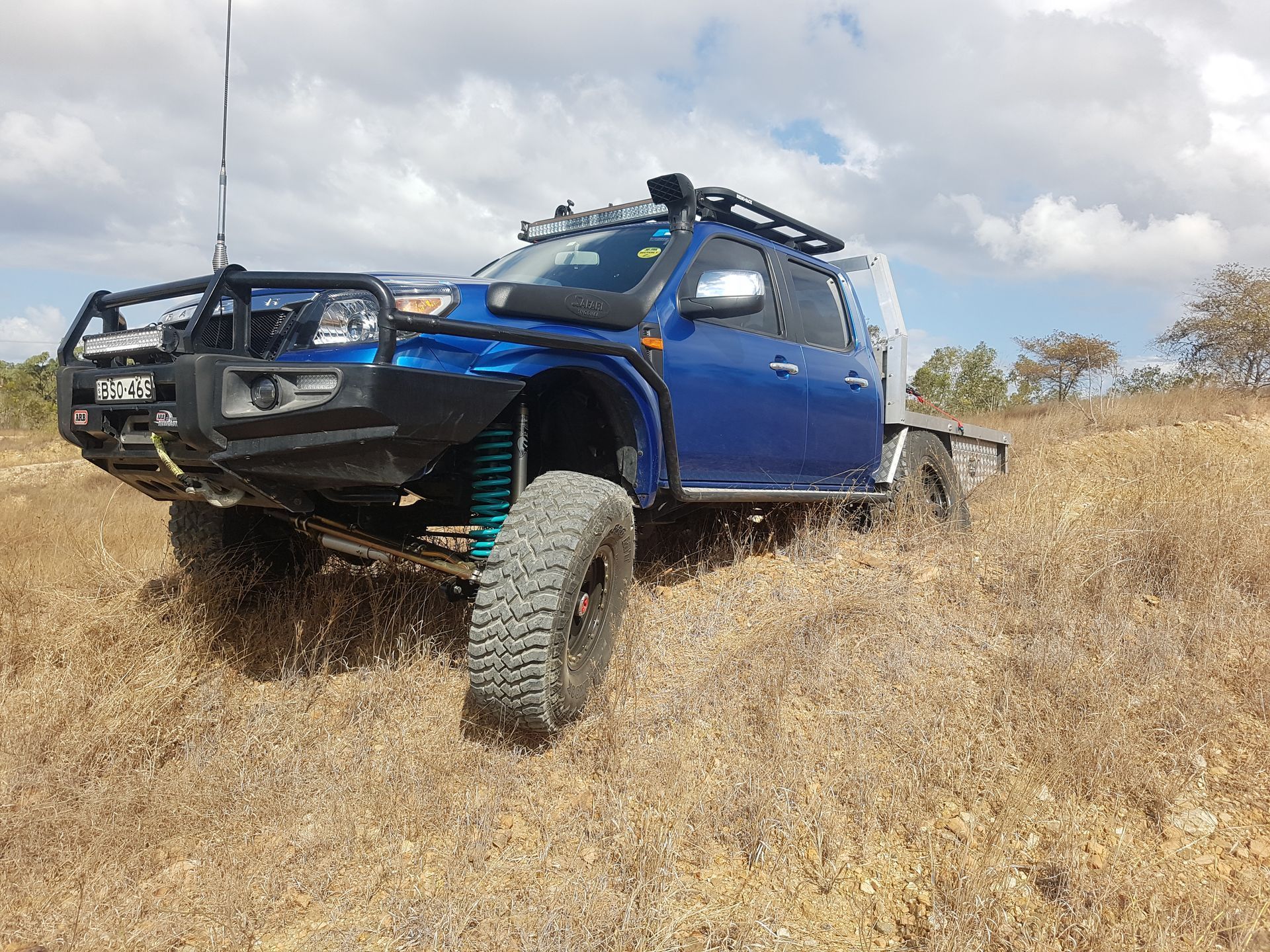 Pickup Truck Parked on A Misty &mdash; Ironhide Customs In Garbutt, QLD