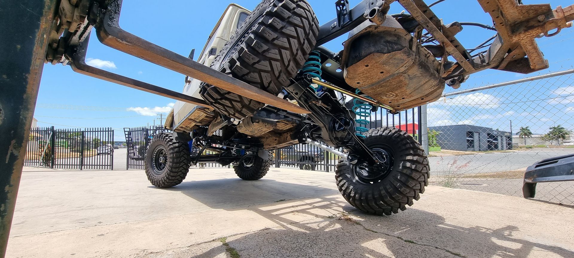 A Vehicle's Undercarriage Showing Turquoise Coil &mdash; Ironhide Customs In Garbutt, QLD