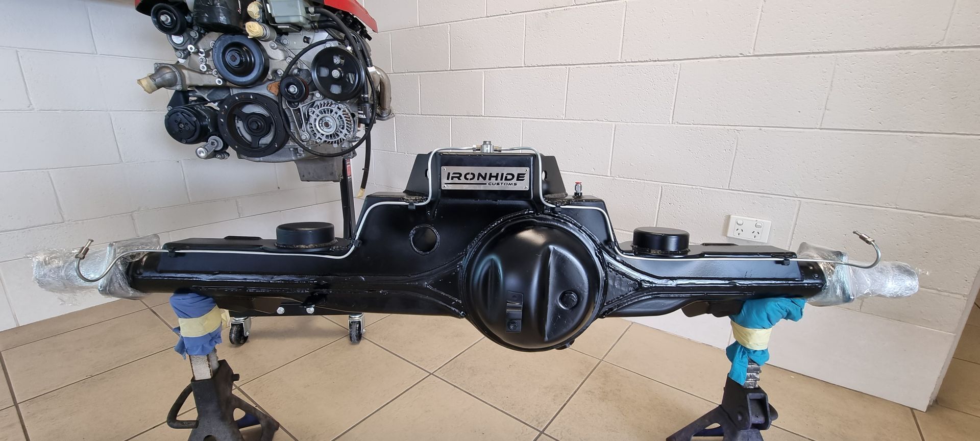 A Freshly Painted Black Automotive Differential Housing — Ironhide Customs In Garbutt, QLD