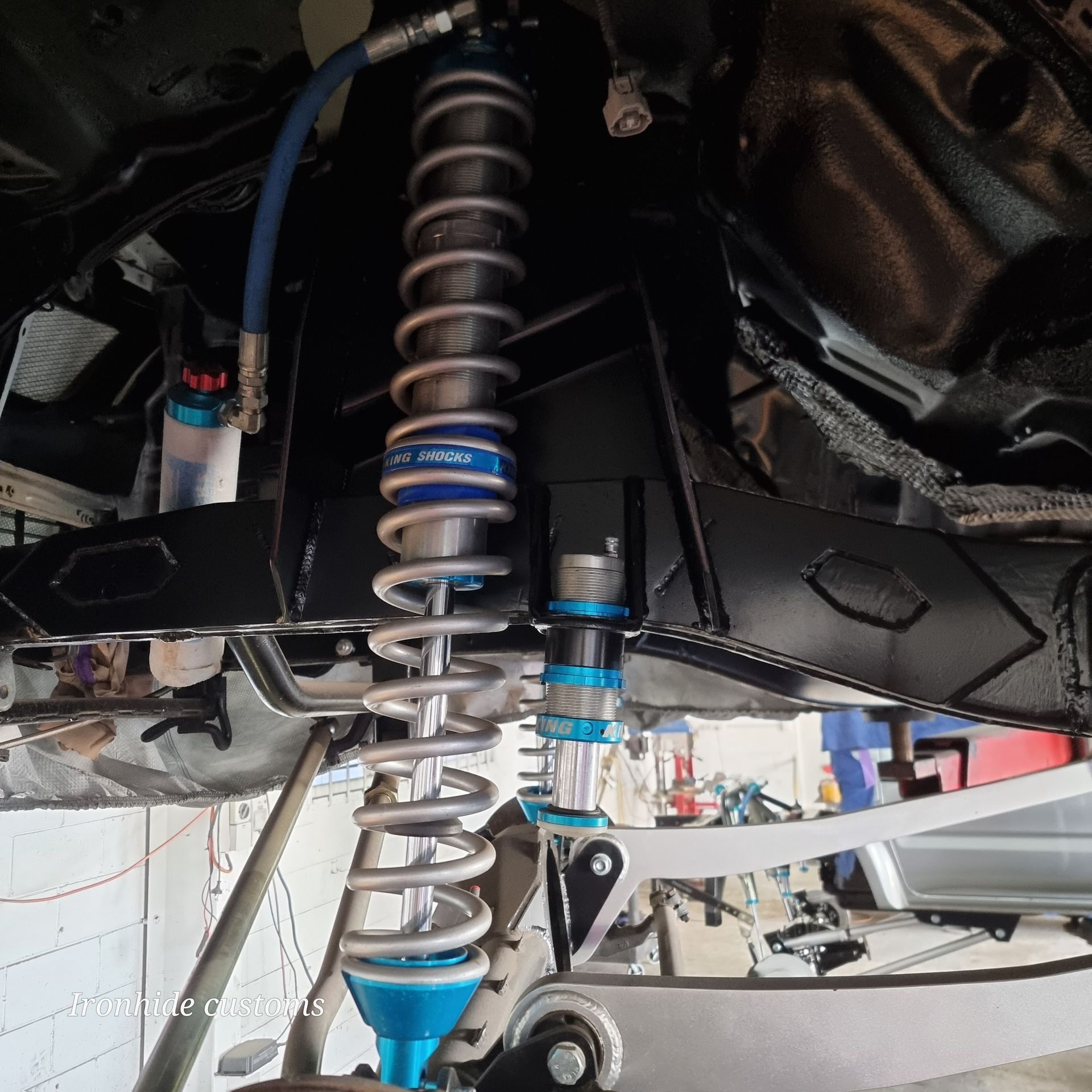 Close-Up View of A Custom Automotive Coilover Suspension System — Ironhide Customs In Garbutt, QLD