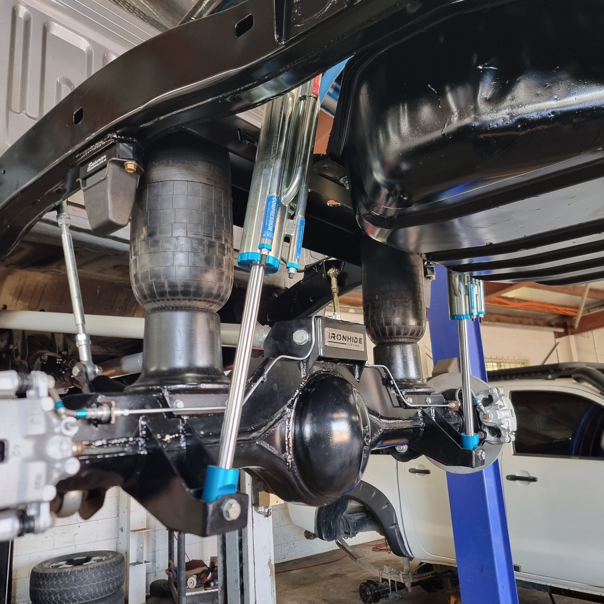 Under-Chassis View of A Vehicle's Rear Axle Assembly — Ironhide Customs In Garbutt, QLD