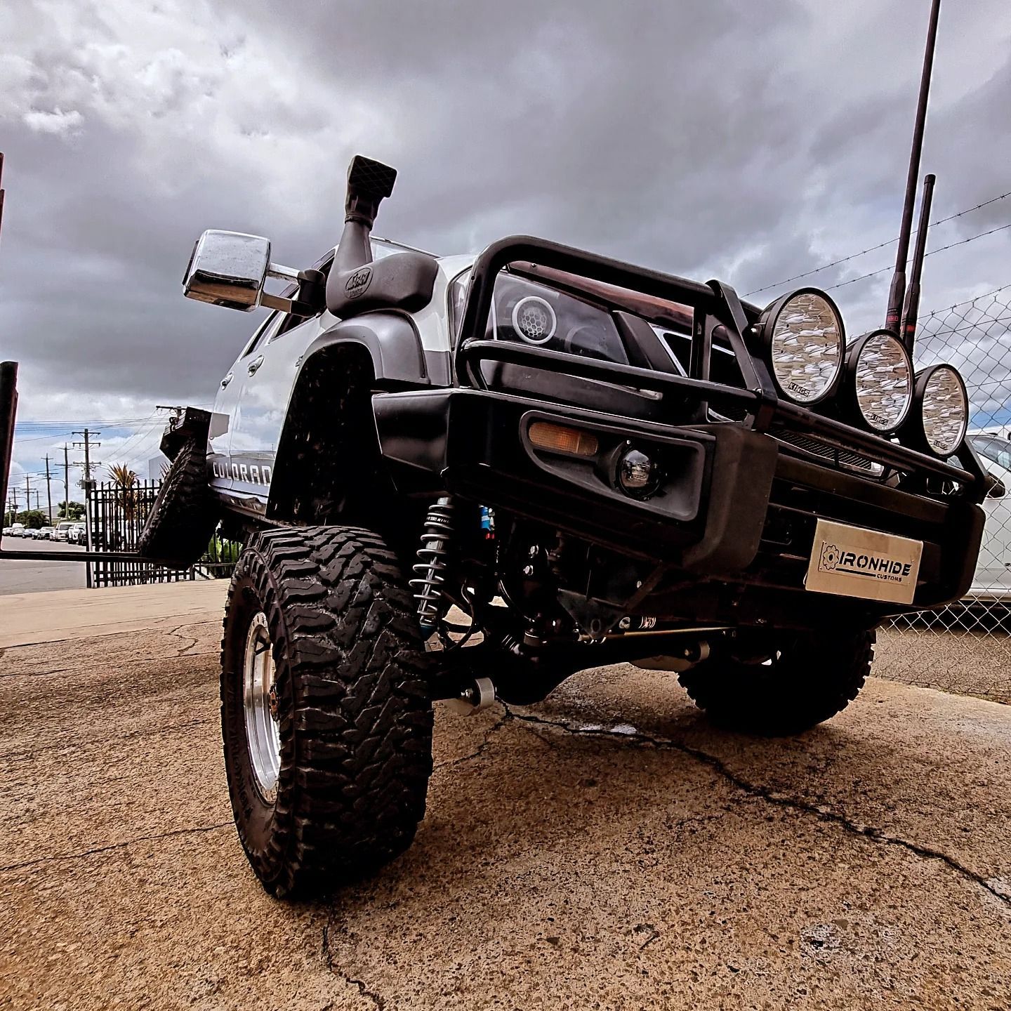 A White Toyota Land Cruiser with Its Hood Open — Ironhide Customs In Garbutt, QLD
