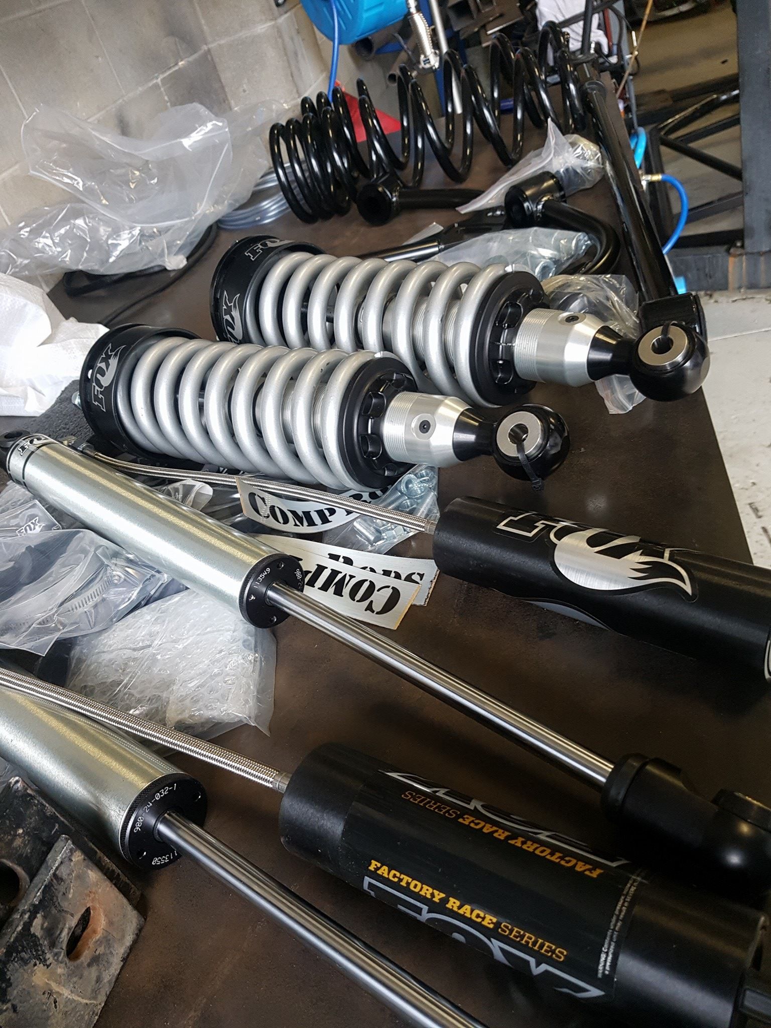 Several Black and Silver Motorcycle Shock Absorbers — Ironhide Customs In Garbutt, QLD