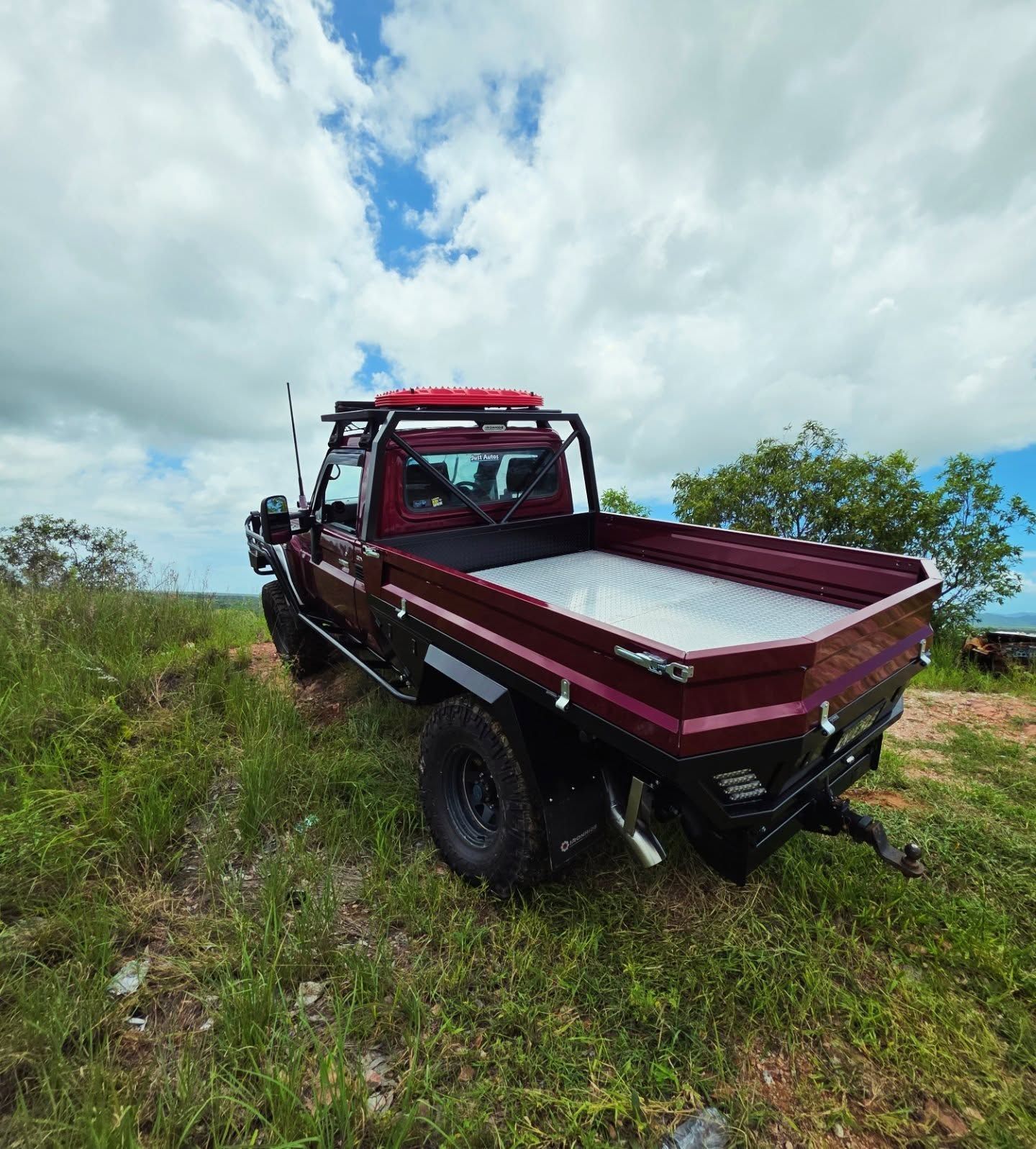 Low-Angle, Close-Up View of A White Off-Road Vehicle's Wheel — Ironhide Customs In Garbutt, QLD