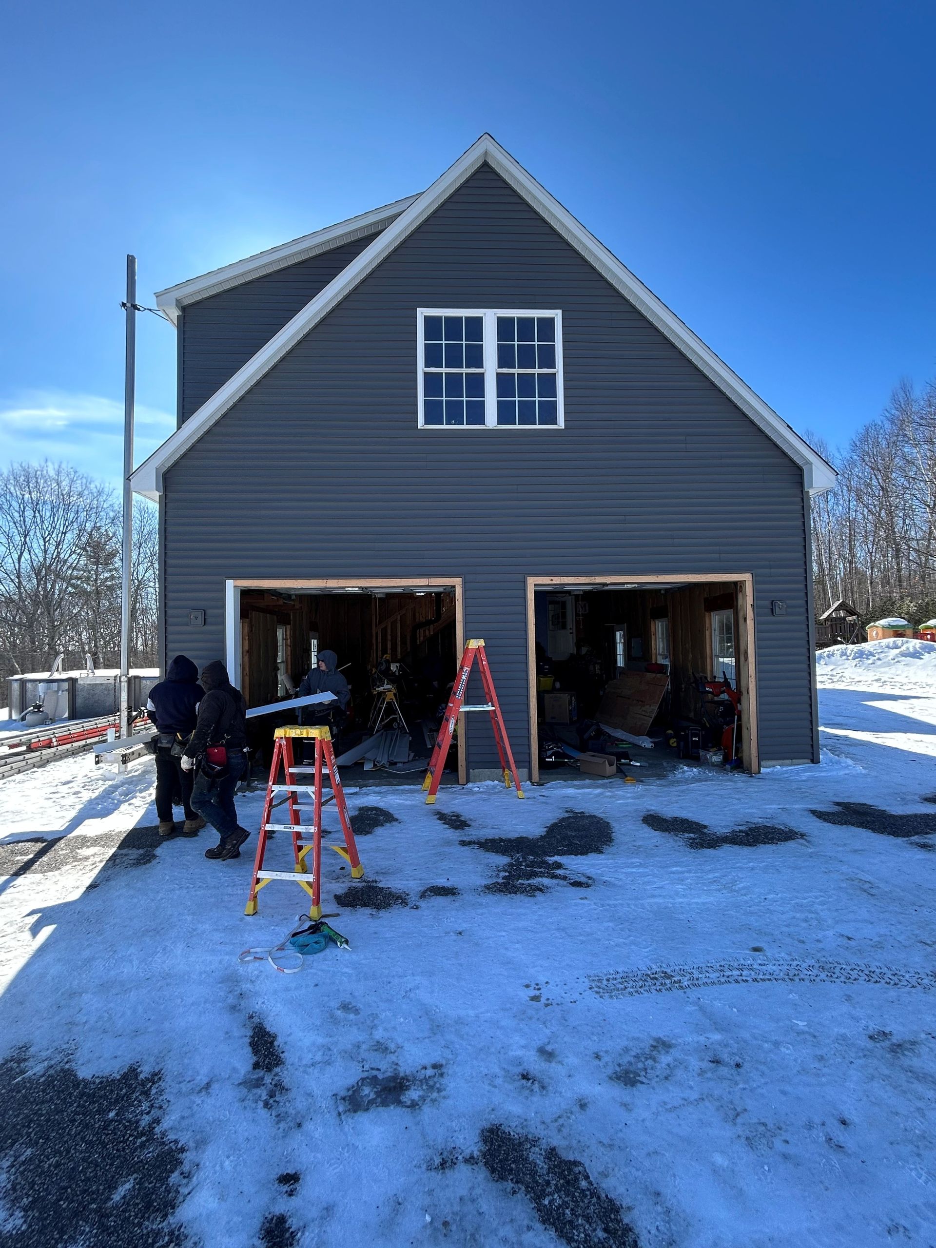 Resided home in Lewiston, ME With Double Garage
