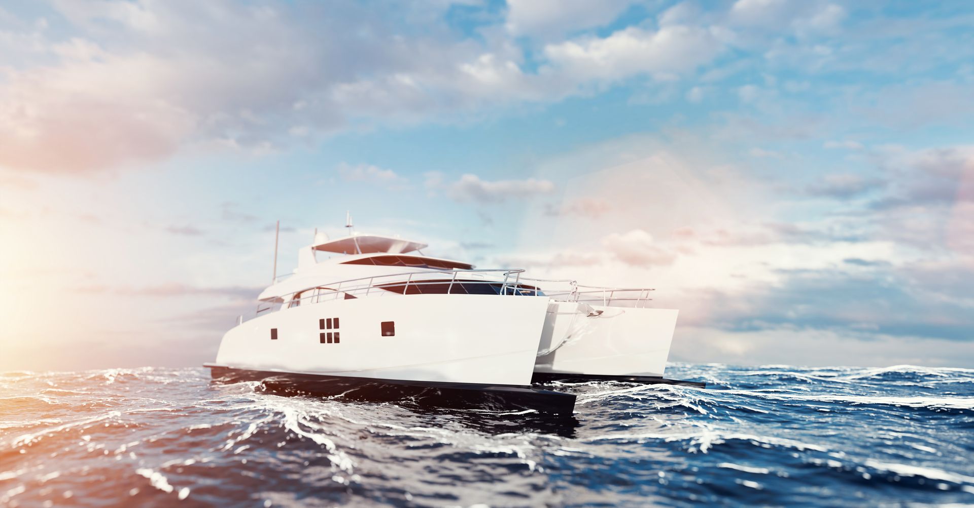 A large white yacht is floating on top of a large body of water.
