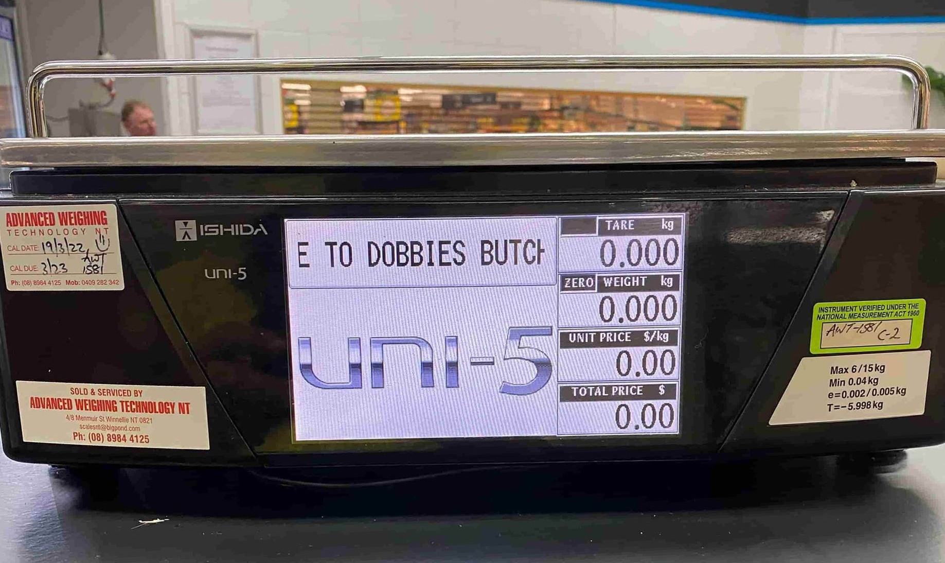 A Scale Is Sitting On A Counter In A Store — Advanced Weighing Technology NT Pty Ltd In Winnellie, NT