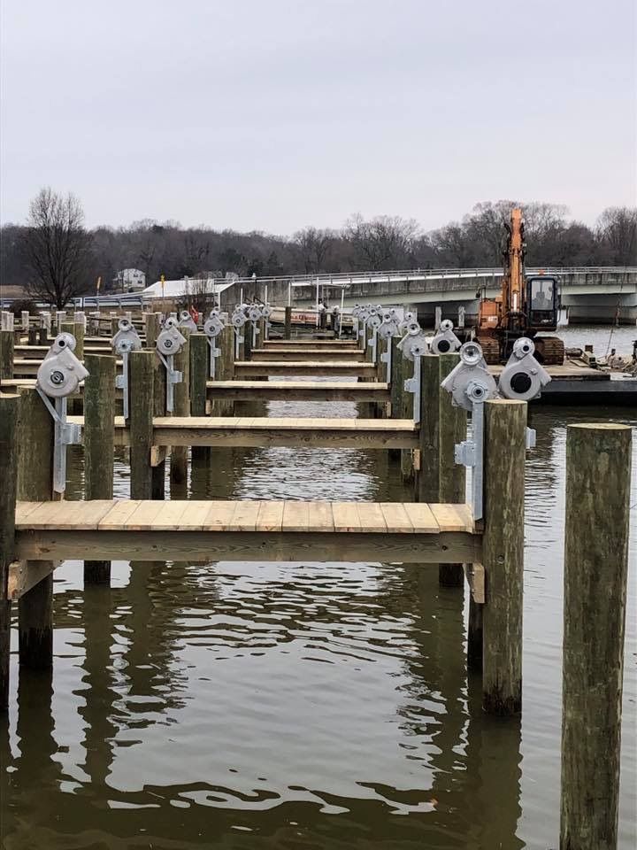 A row of wooden dock in a body of water