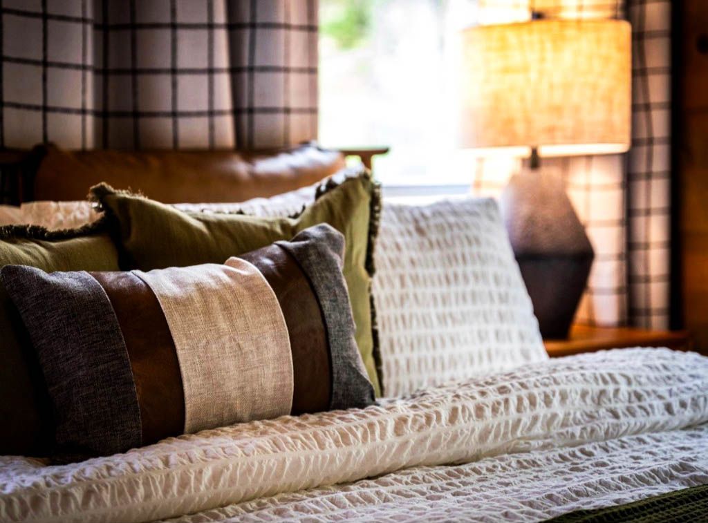 A made-up bed presenting for photos.