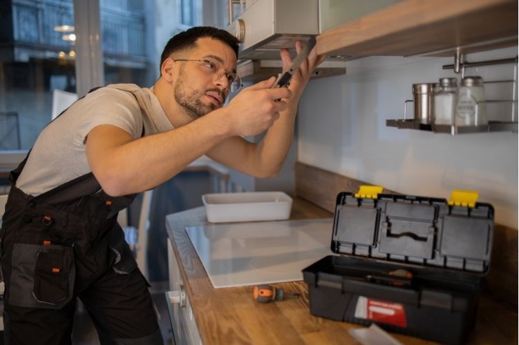 handyman fixing up a home