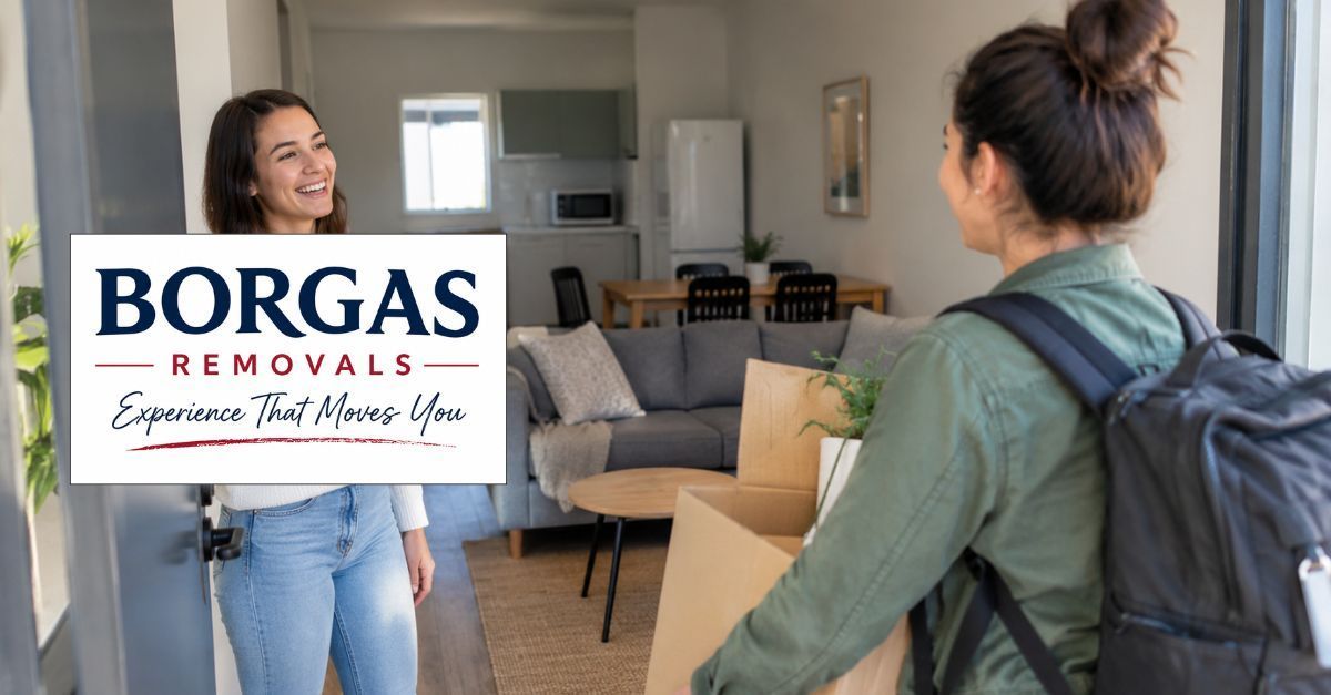 Young woman welcomes a friend moving into her new apartment with household furniture and appliances.