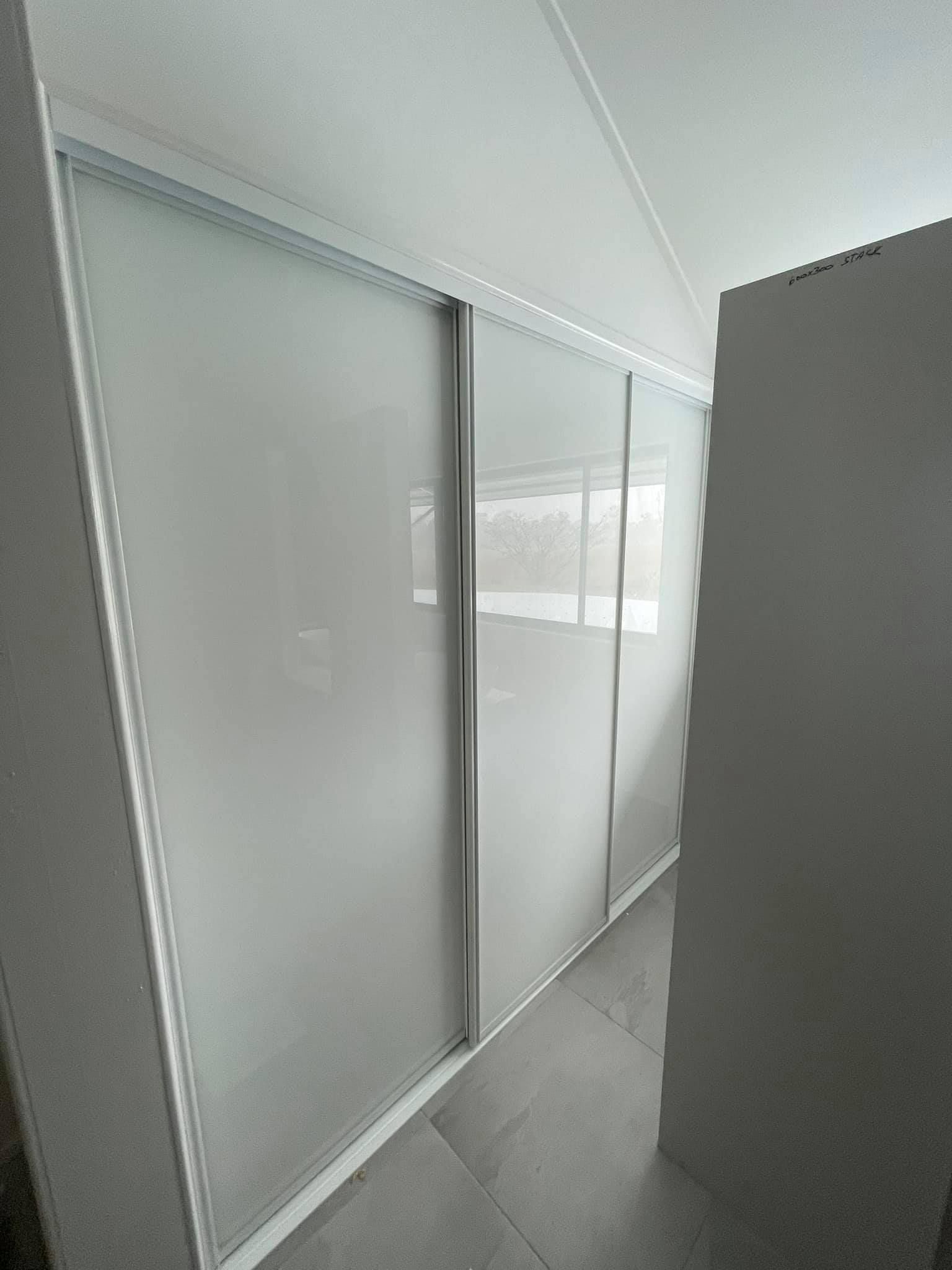 White Sliding Closet Doors — Moore Park Beach Glass & Security in Woodgate, QLD