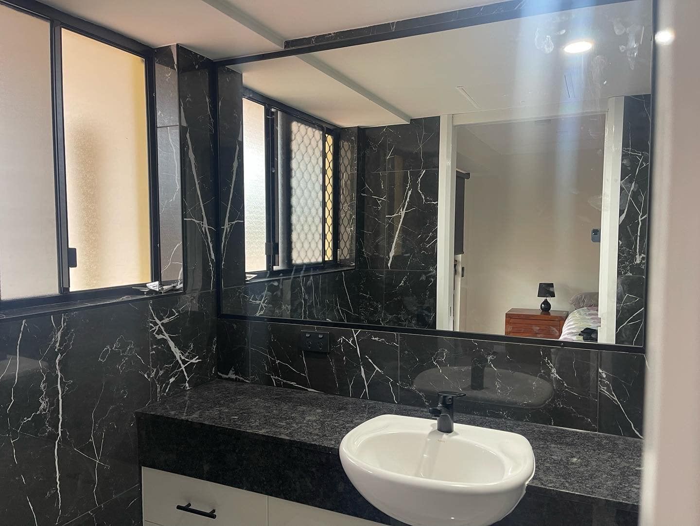 Black Marble Bathroom — Moore Park Beach Glass & Security in Moore Park Beach, QLD