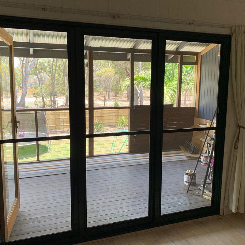 Interior Featuring Sliding Glass Door — Moore Park Beach Glass & Security in Moore Park Beach, QLD