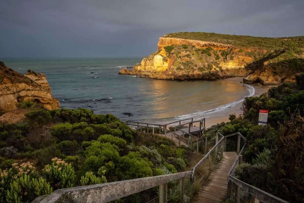 Path Leading to a Beach on a Cloudy Day — Moore Park Beach Glass & Security in Childers, QLD
