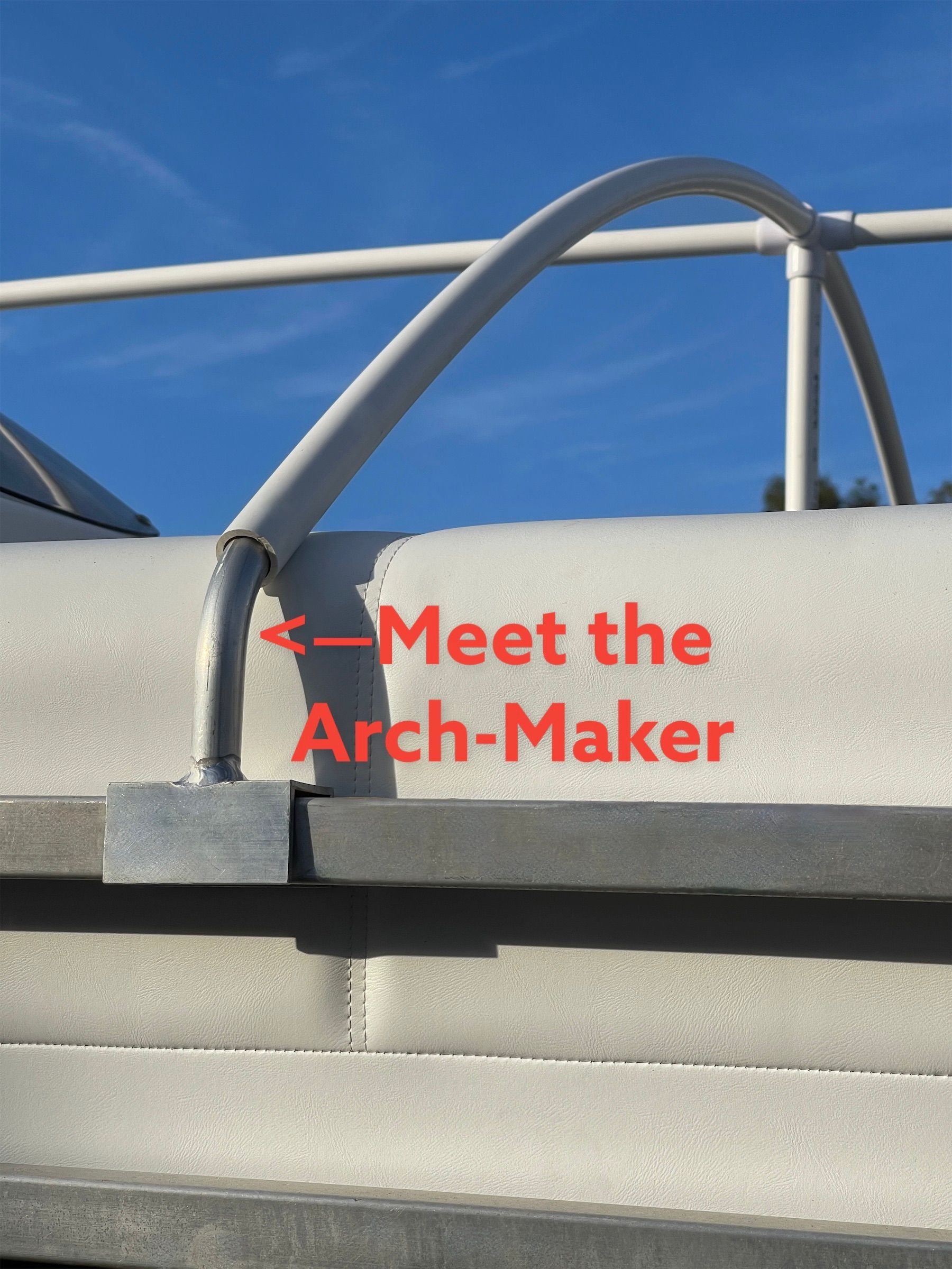 Pontoon Boat Canvas Solution arch against a blue sky