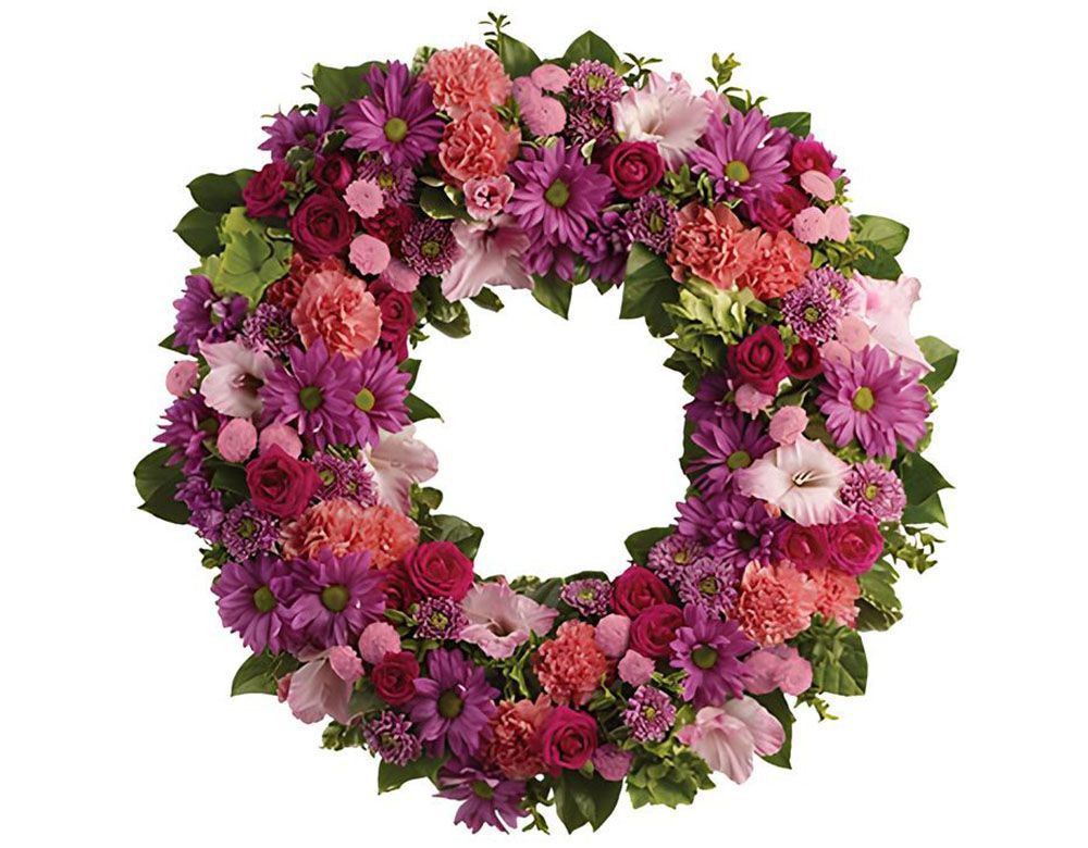 A Wreath of Pink and Purple Flowers on A White Background — Pick-A-Bunch Florists & Gifts In Sarina, QLD
